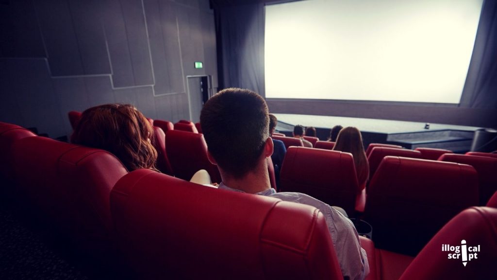 couple watching movie in a cinema hall