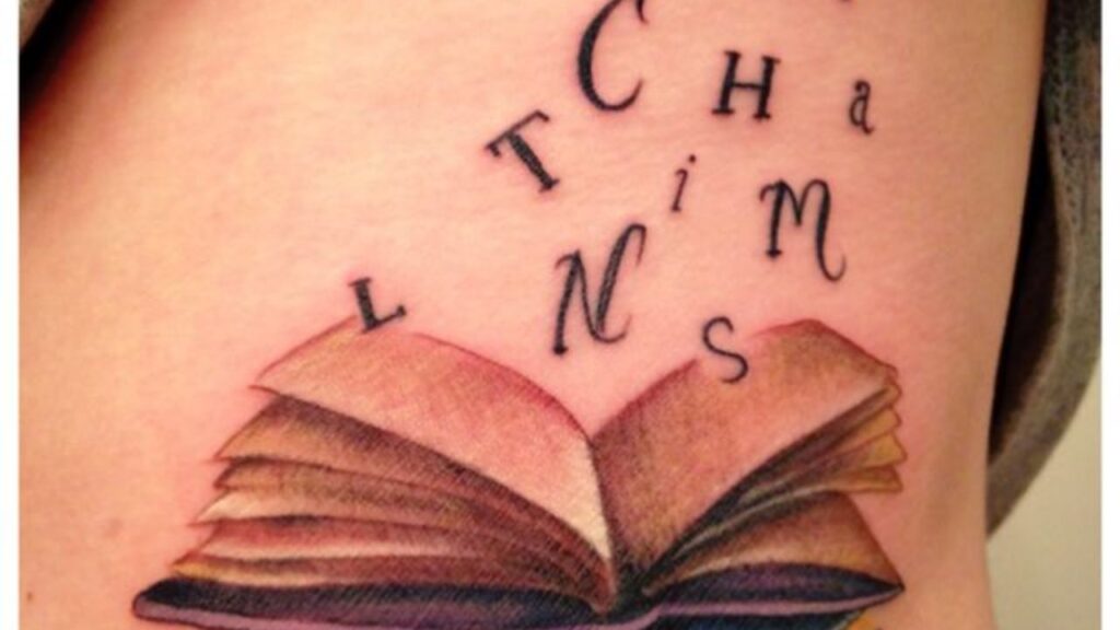 letter and book tattoo