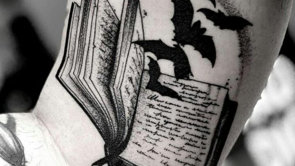 dark book design tattoo