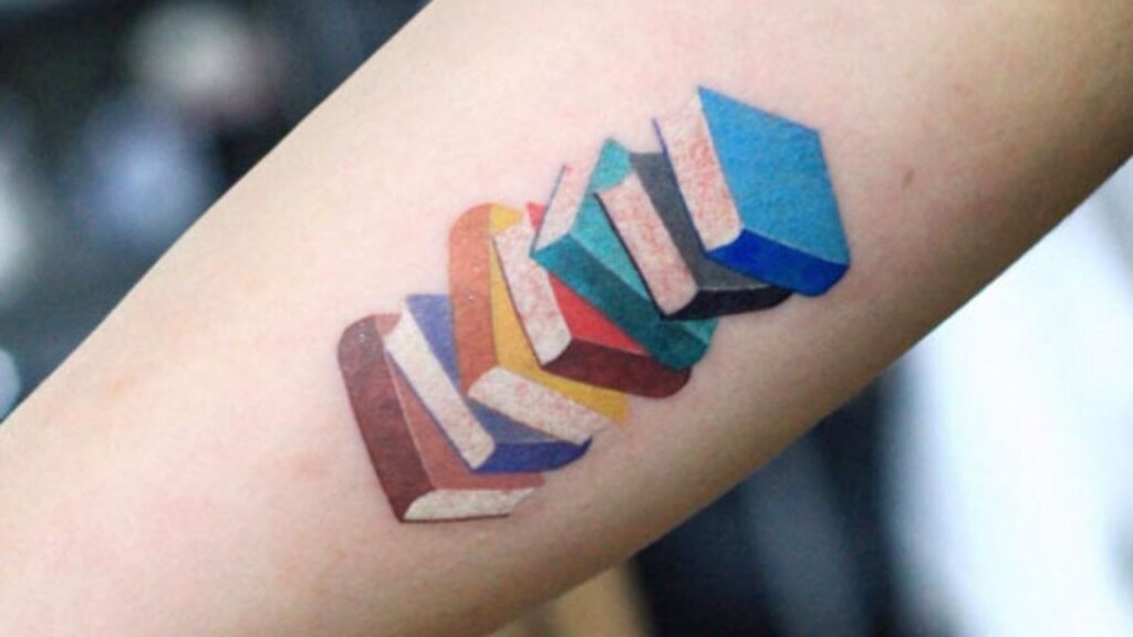 colorful books tattoo