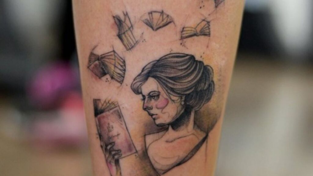 reading a book tattoo