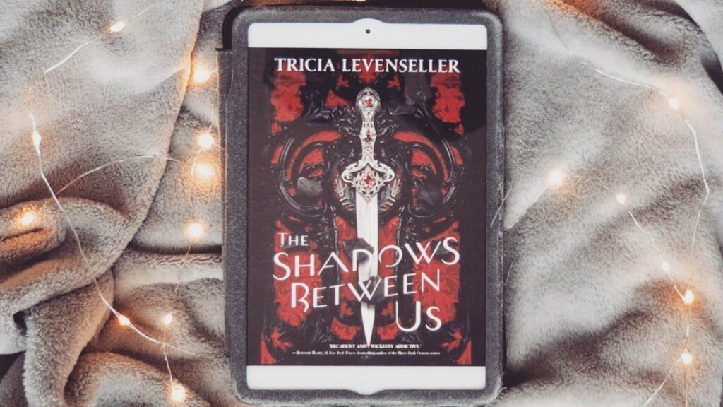 The-Shadows-between-Us-by-Tricia-Levenseller cover image