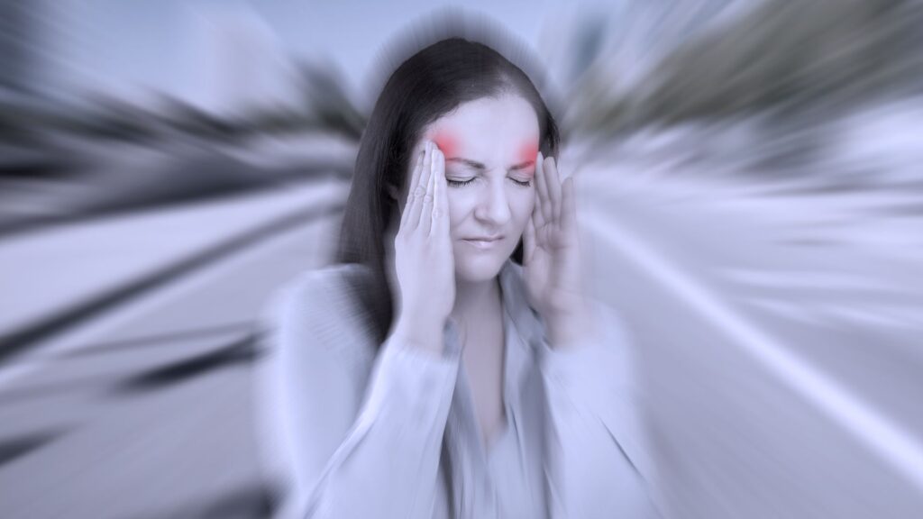a woman having a severe headache