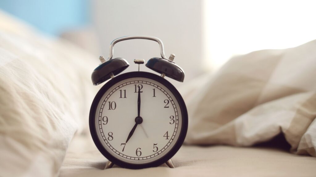 alarm clock early in the morning | How to Stay Consistent in Reading More Books