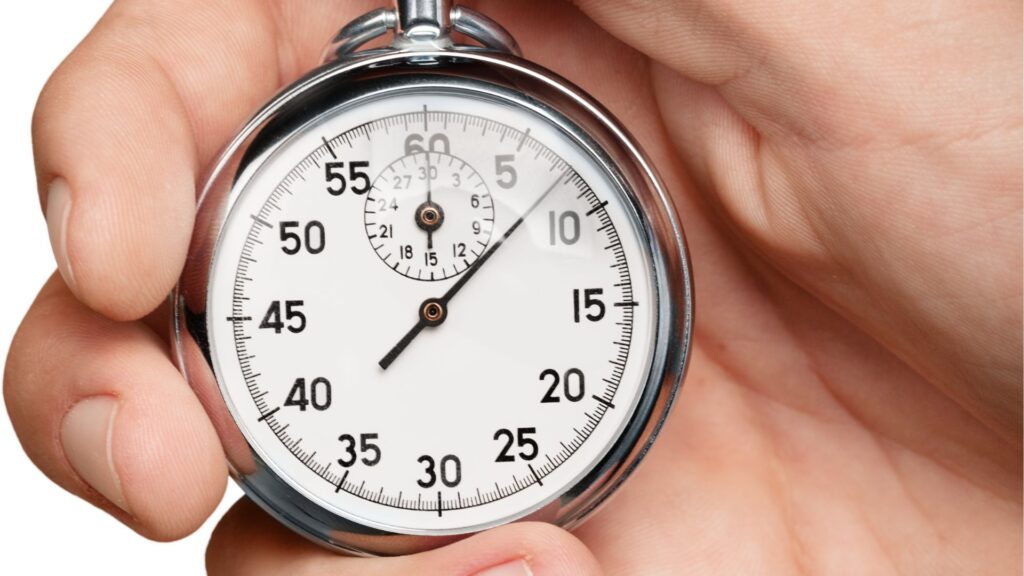 a stopwatch in someone's hand | Can Silent Reading Help Improve Reading Skills